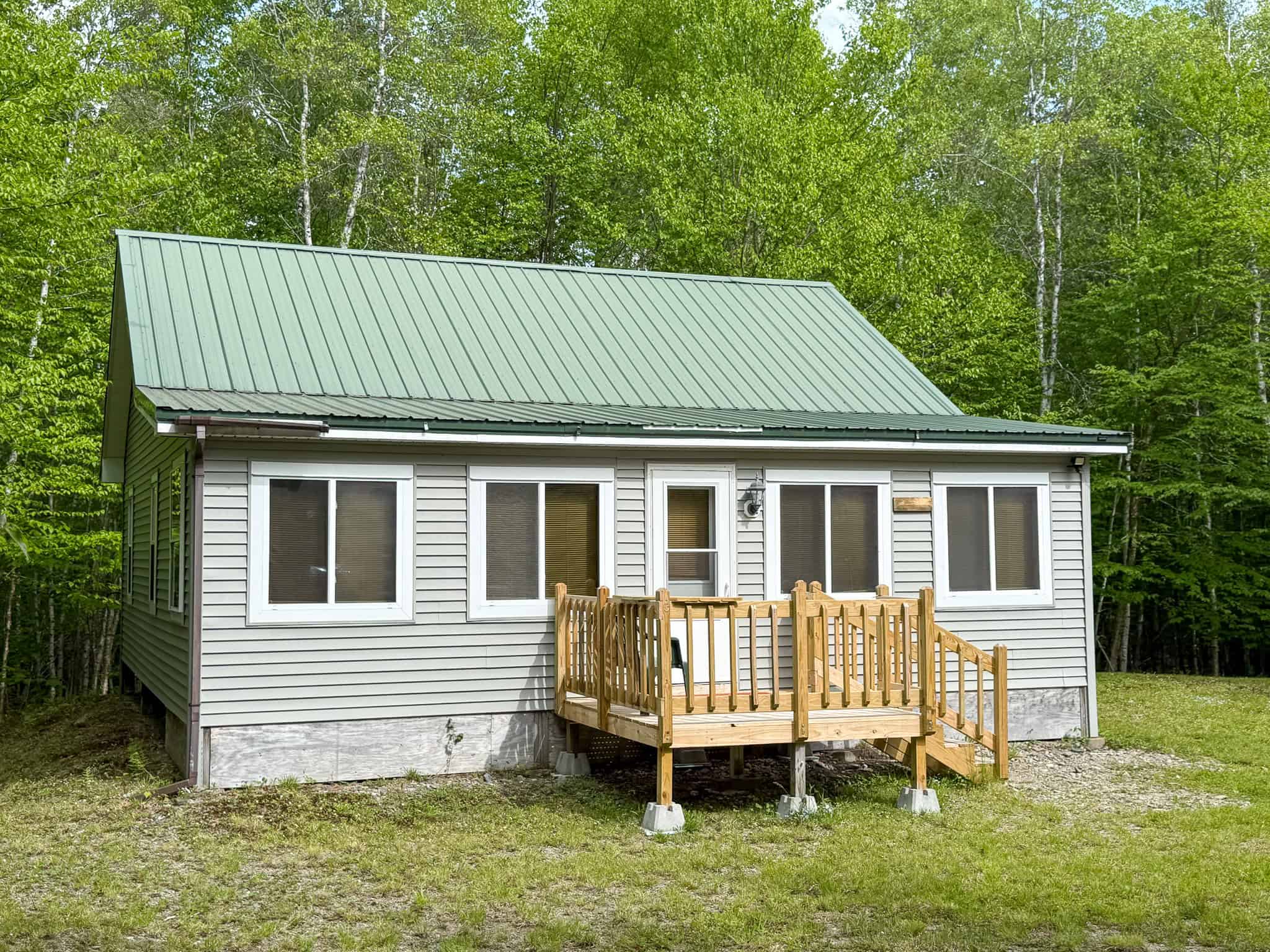 46 Acres of Maine Wilderness with Turnkey Off-Grid Cabin & Garage