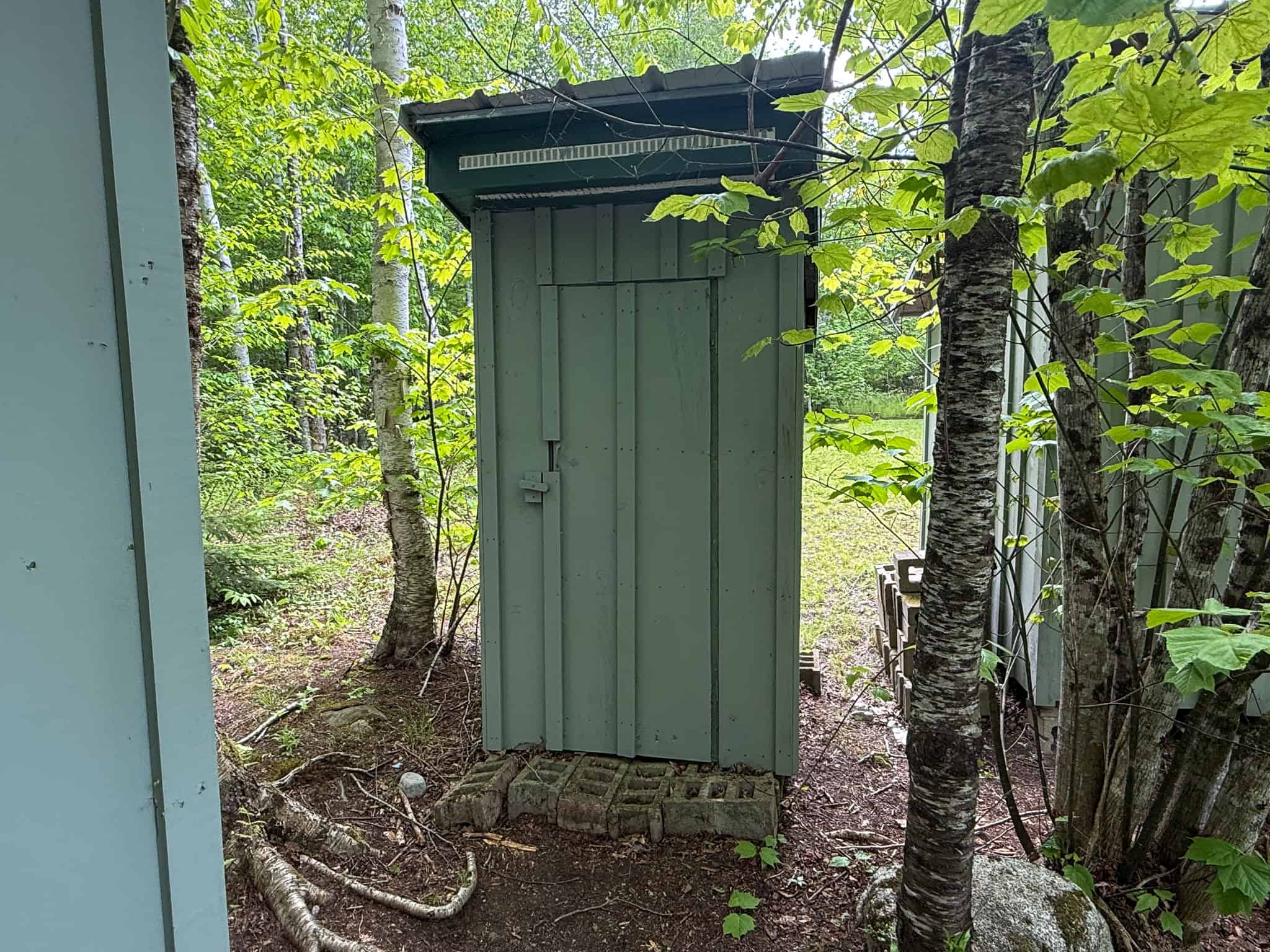 46 Acres of Maine Wilderness with Turnkey Off-Grid Cabin & Garage