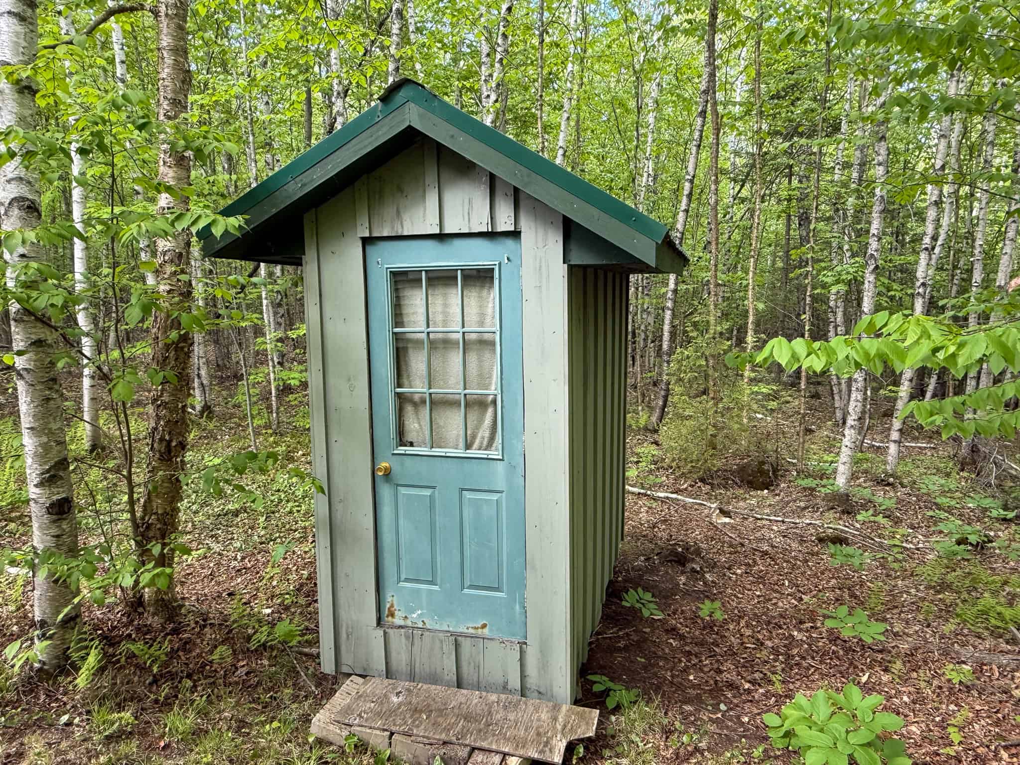 46 Acres of Maine Wilderness with Turnkey Off-Grid Cabin & Garage