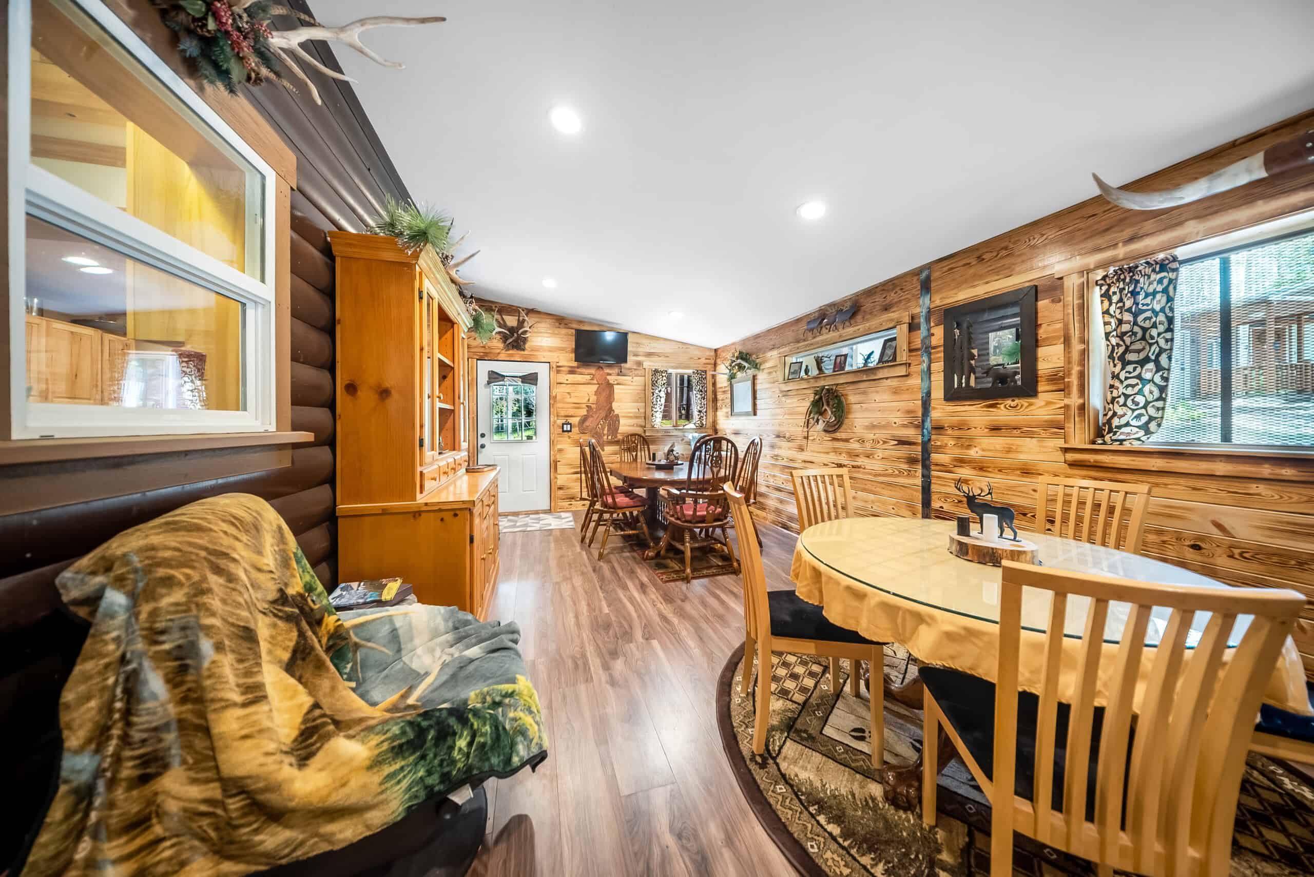 Colorado Mountain Hunting Retreat Surrounded By Thousands of Acres of Public Land in Garfield County With Low Flowing Creek and Multiple Cabins and Lodge