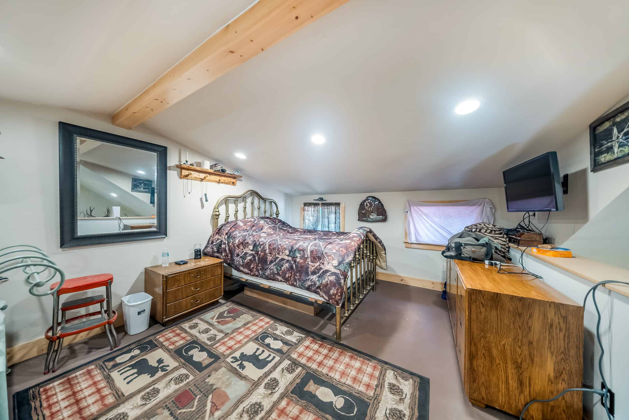 Colorado Mountain Hunting Retreat Surrounded By Thousands of Acres of Public Land in Garfield County With Low Flowing Creek and Multiple Cabins and Lodge