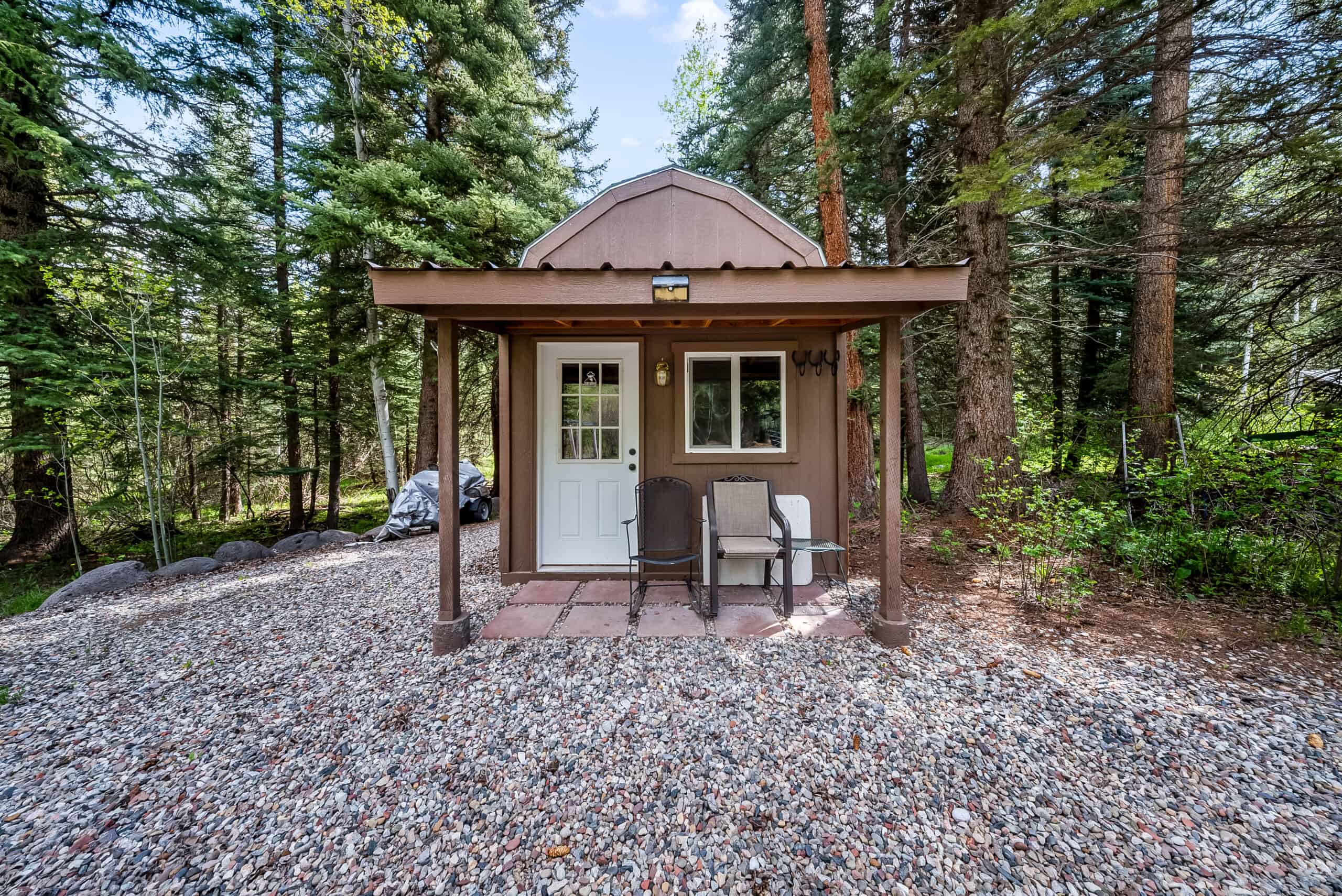 Colorado Mountain Hunting Retreat Surrounded By Thousands of Acres of Public Land in Garfield County With Low Flowing Creek and Multiple Cabins and Lodge