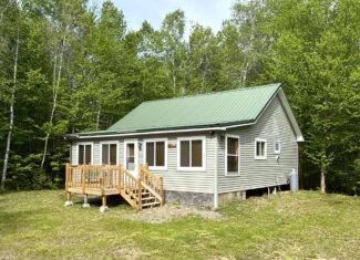 46 Acres of Maine Wilderness with Turnkey Off-Grid Cabin & Garage