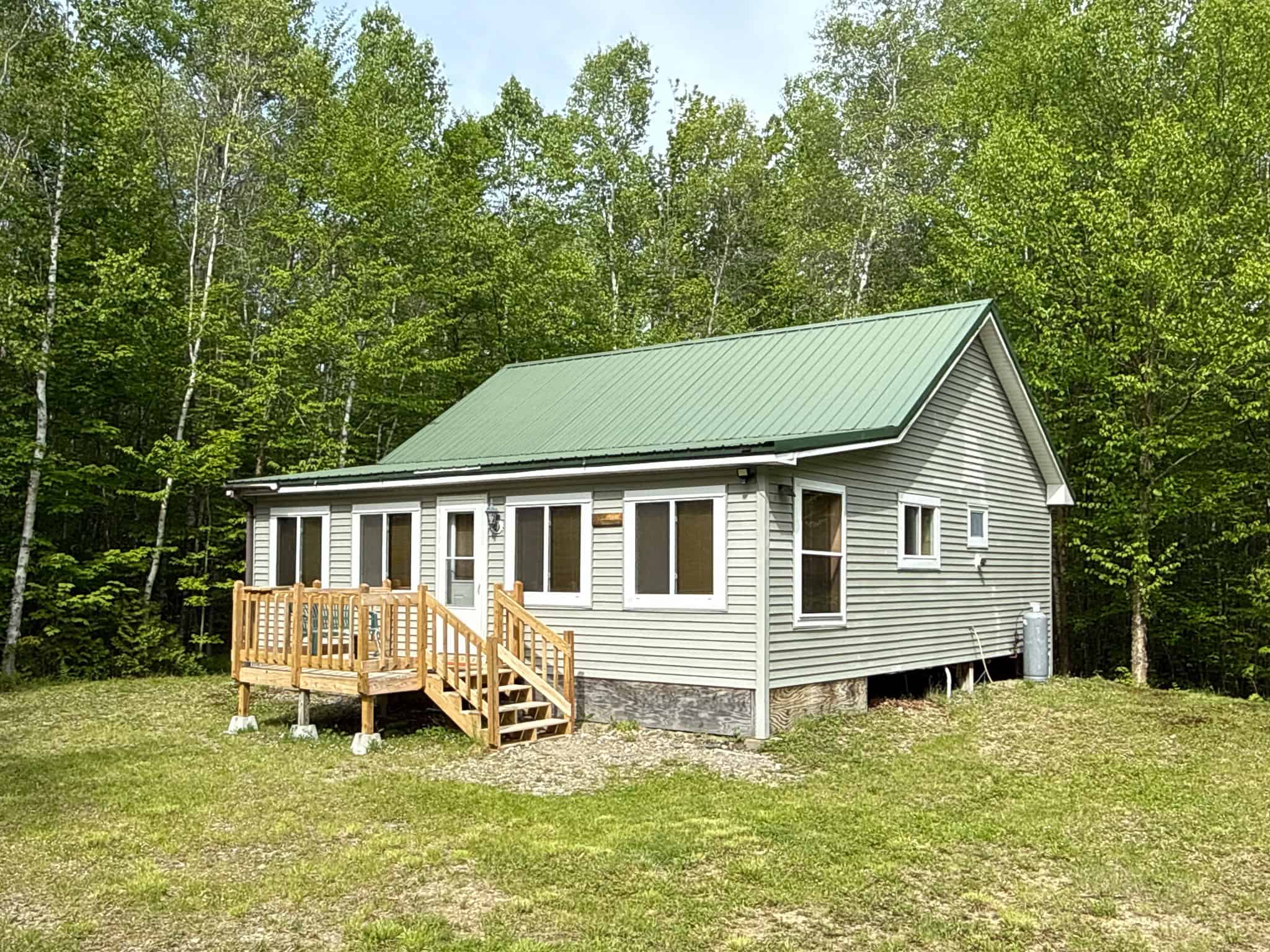 46 Acres of Maine Wilderness with Turnkey Off-Grid Cabin & Garage