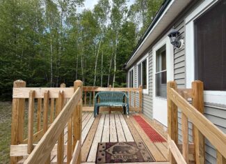 46 Acres of Maine Wilderness with Turnkey Off-Grid Cabin & Garage