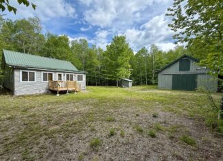 46 Acres of Maine Wilderness with Turnkey Off-Grid Cabin & Garage