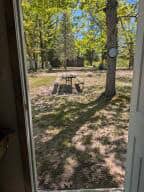 Cabin in Canada Creek Ranch w/ Deeded Access to Lake Geneva Atlanta MI