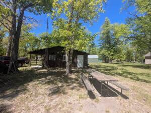 Cabin in Canada Creek Ranch w/ Deeded Access to Lake Geneva Atlanta MI