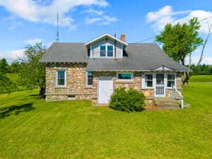 Historic Michigan Farmstead with 22.50 Acres Atlanta MI