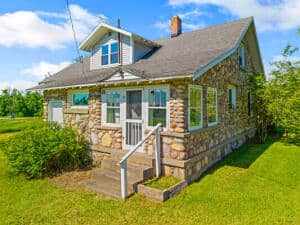 Historic Michigan Farmstead with 22.50 Acres Atlanta MI