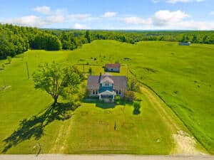 Historic Michigan Farmstead with 22.50 Acres Atlanta MI