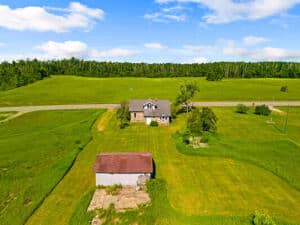 Historic Michigan Farmstead with 22.50 Acres Atlanta MI
