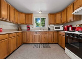 Classic Canada Creek Ranch Log Cabin with Lake Geneva Views