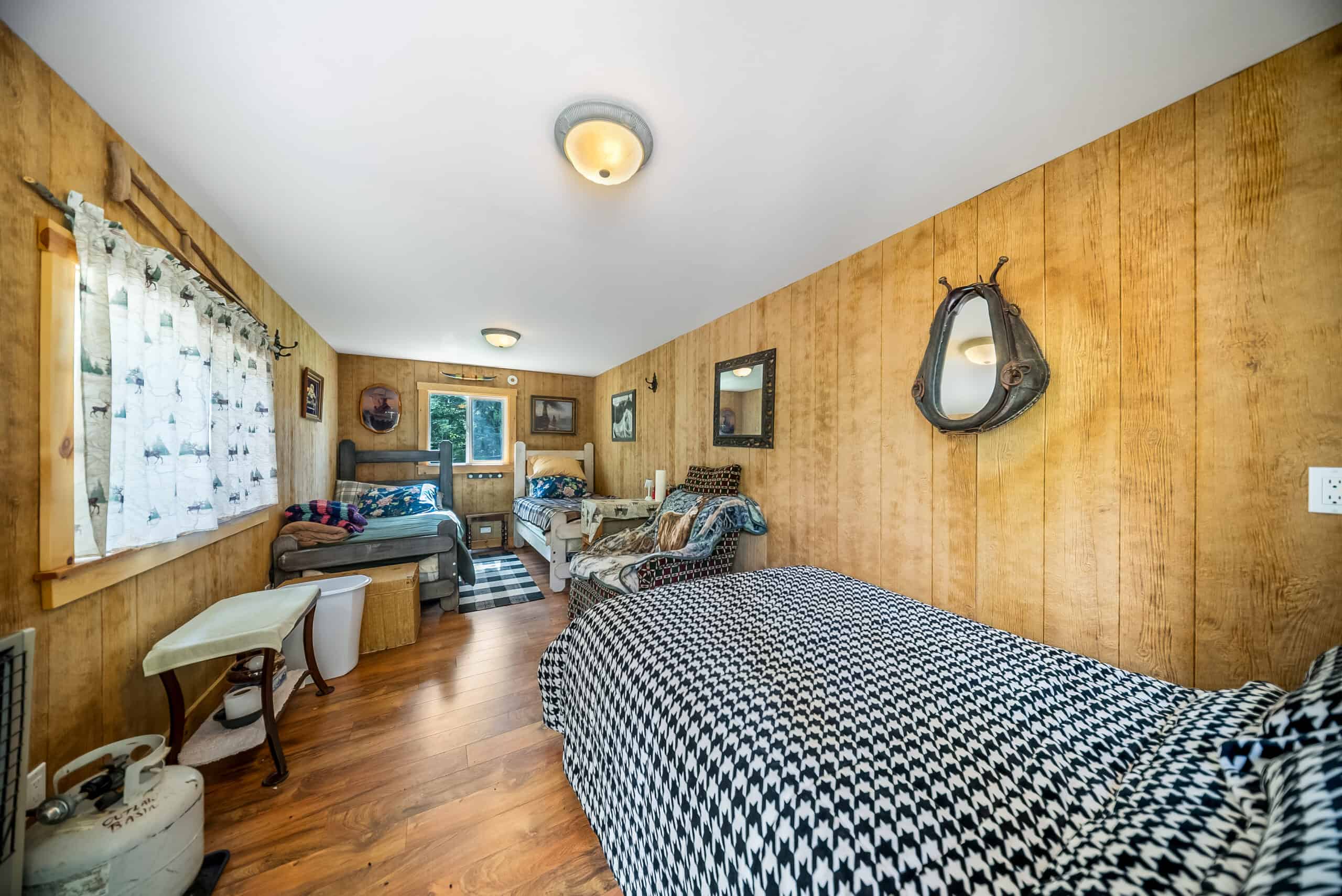 Colorado Mountain Hunting Retreat Surrounded By Thousands of Acres of Public Land in Garfield County With Low Flowing Creek and Multiple Cabins and Lodge