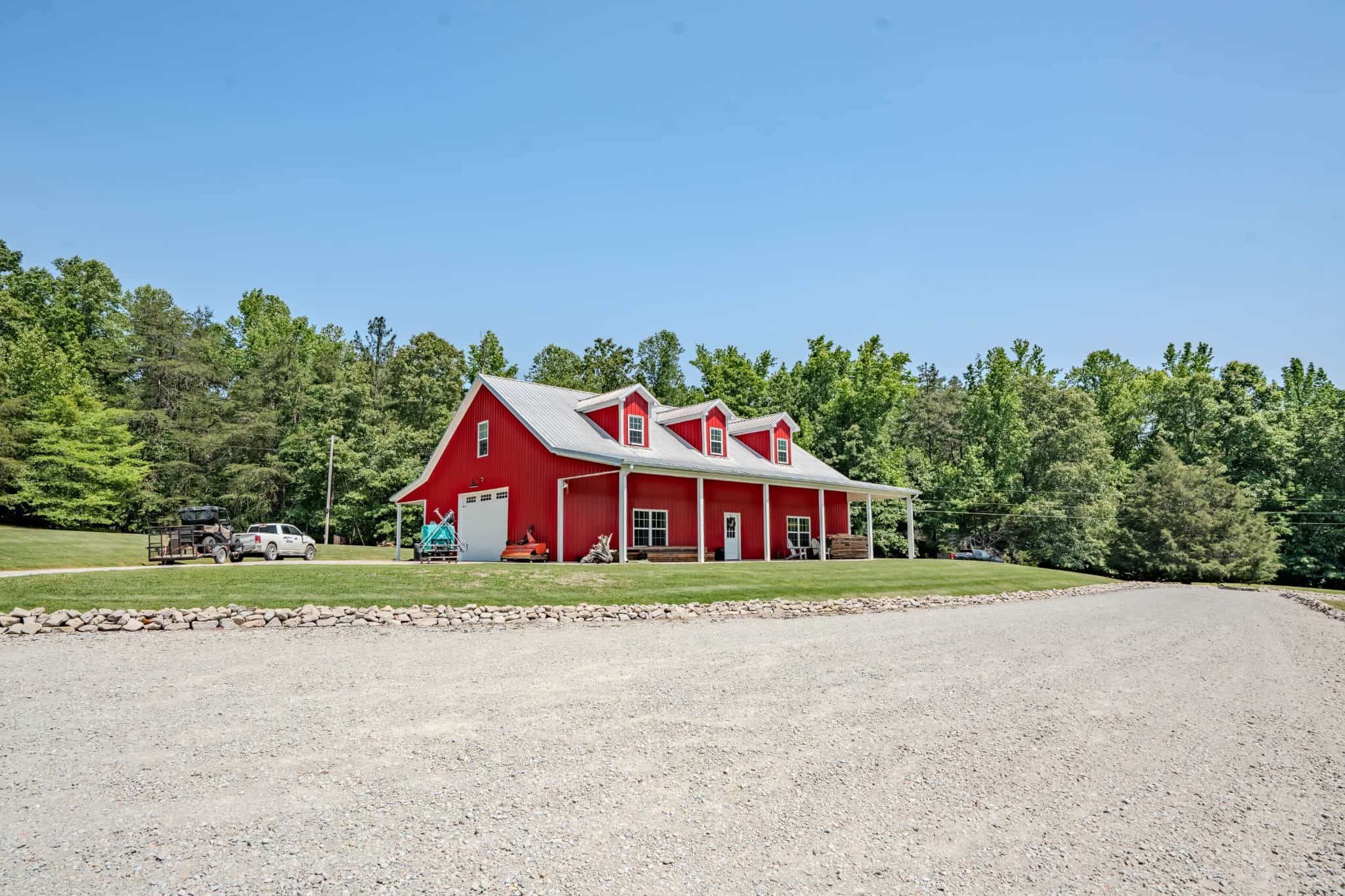 PRIVATE 394 ACRE TENNESSEE ESTATE WITH HOME, SHOP, CREEK, POND,TEARMING WITH WHITETAIL DEER AND TURKEY