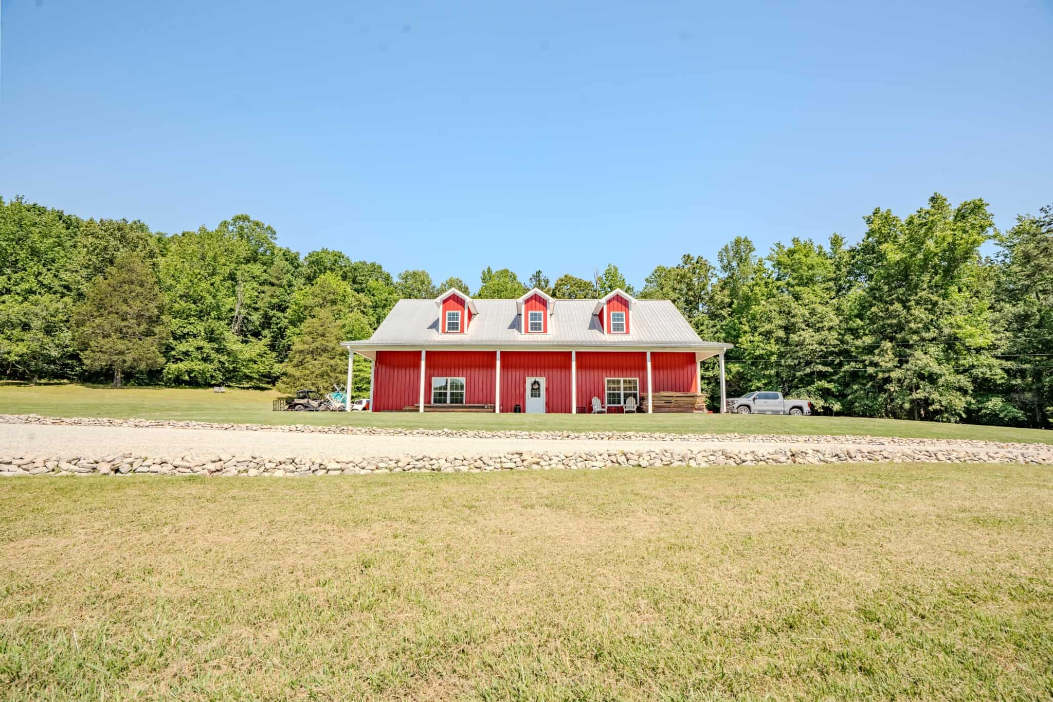 PRIVATE 394 ACRE TENNESSEE ESTATE WITH HOME, SHOP, CREEK, POND,TEARMING WITH WHITETAIL DEER AND TURKEY