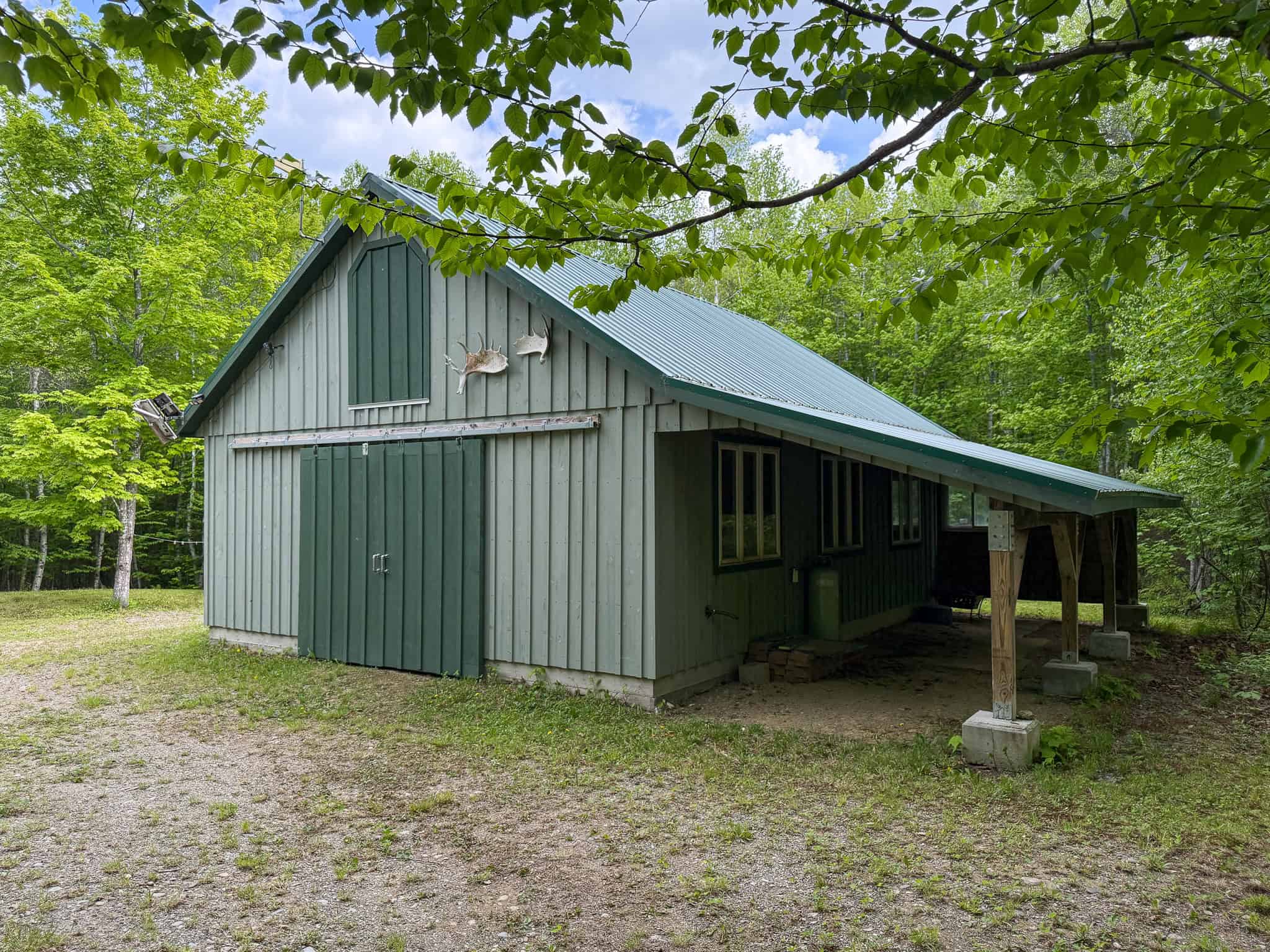 46 Acres of Maine Wilderness with Turnkey Off-Grid Cabin & Garage