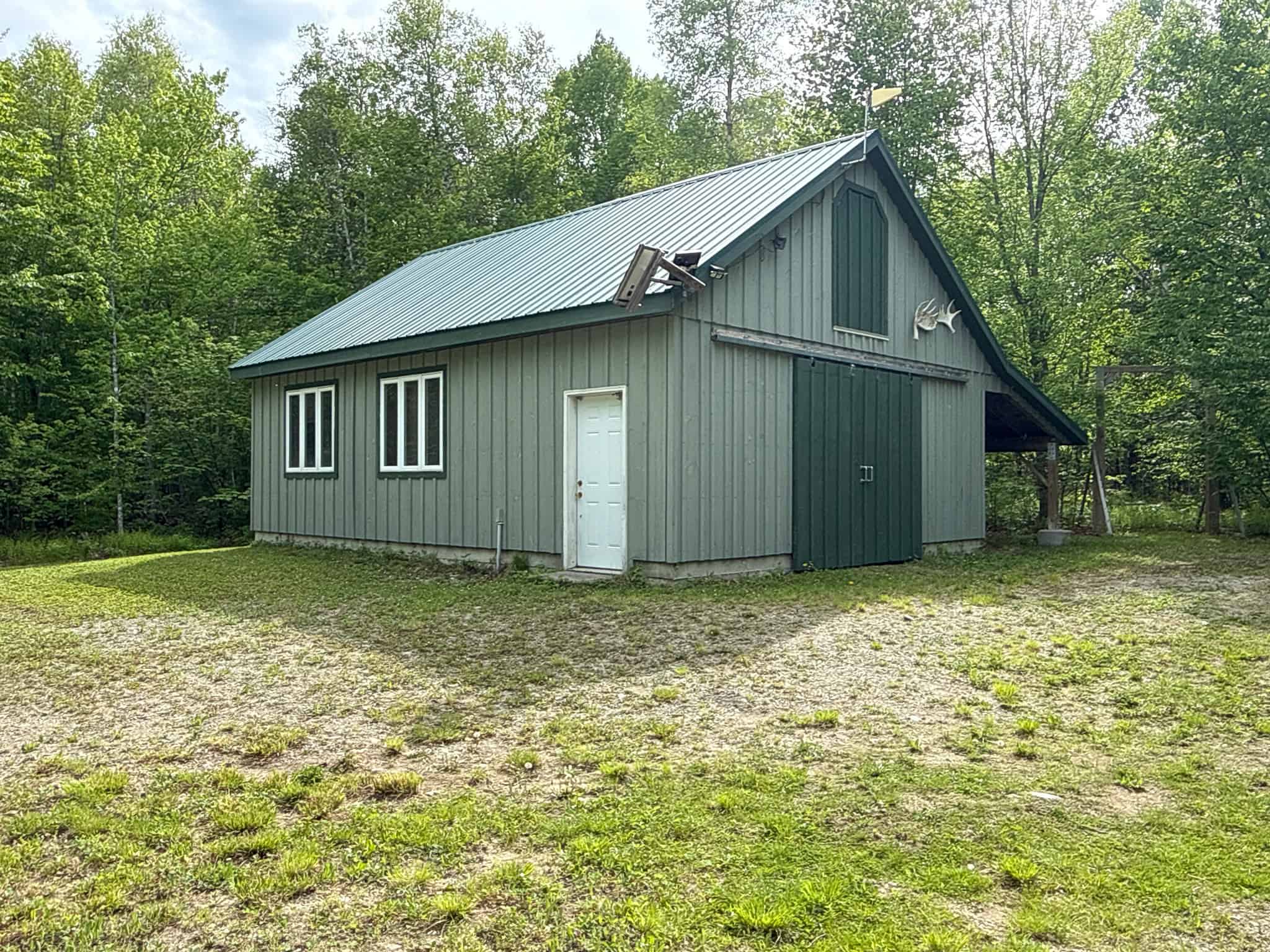 46 Acres of Maine Wilderness with Turnkey Off-Grid Cabin & Garage