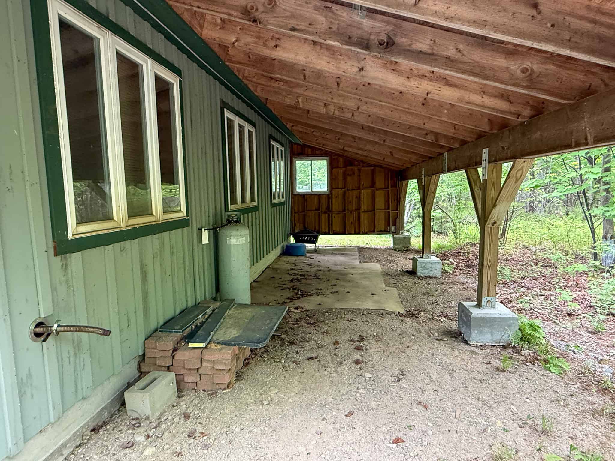 46 Acres of Maine Wilderness with Turnkey Off-Grid Cabin & Garage