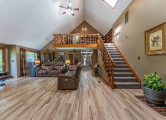 88-Acre Horse Farm with Custom Ranch Home, Stables, Ponds & Private Gated Drive