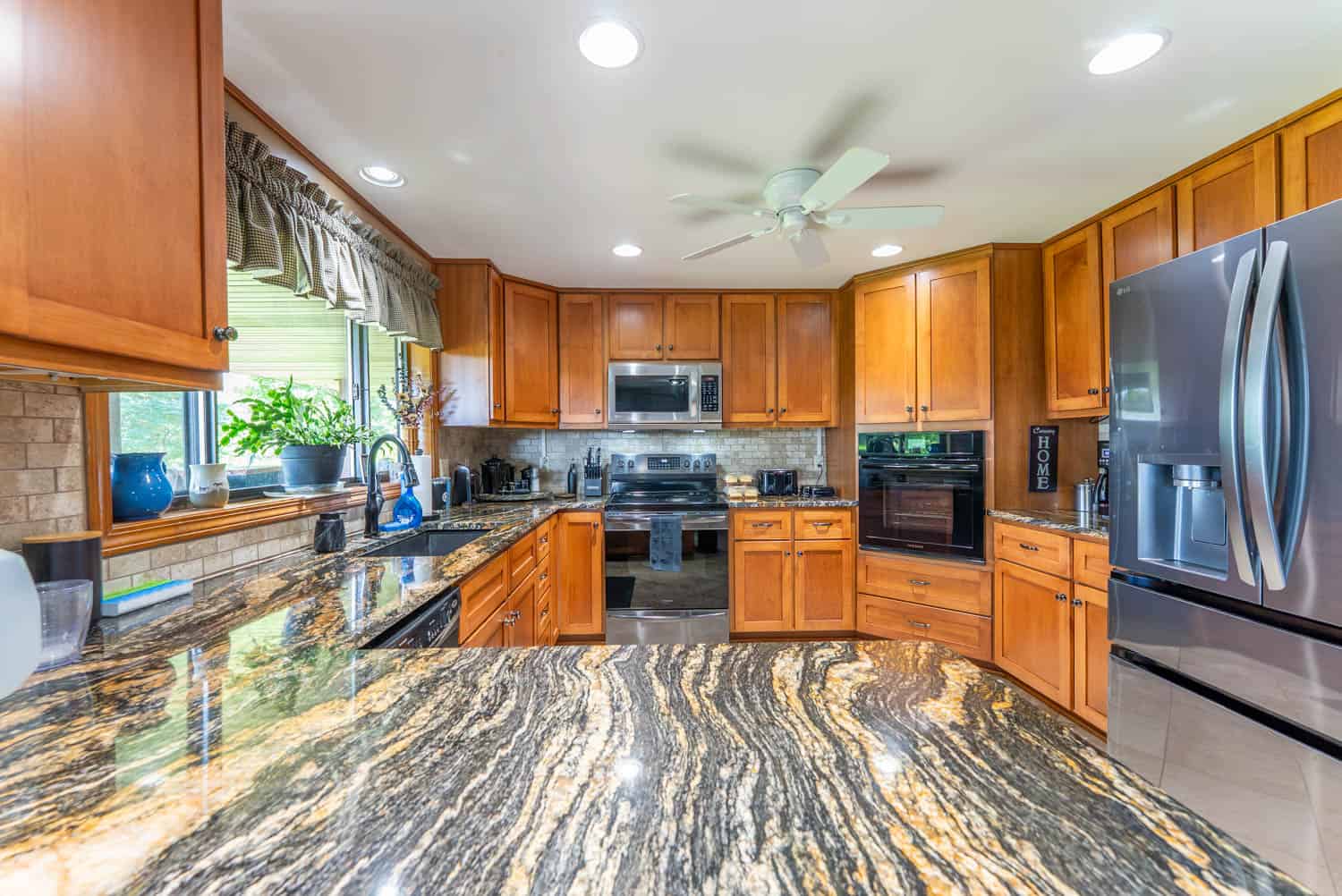 88-Acre Horse Farm with Custom Ranch Home, Stables, Ponds & Private Gated Drive