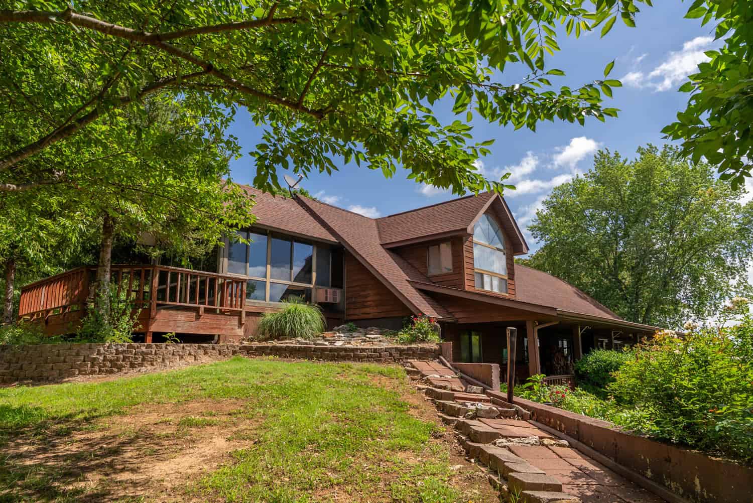 88-Acre Horse Farm with Custom Ranch Home, Stables, Ponds & Private Gated Drive
