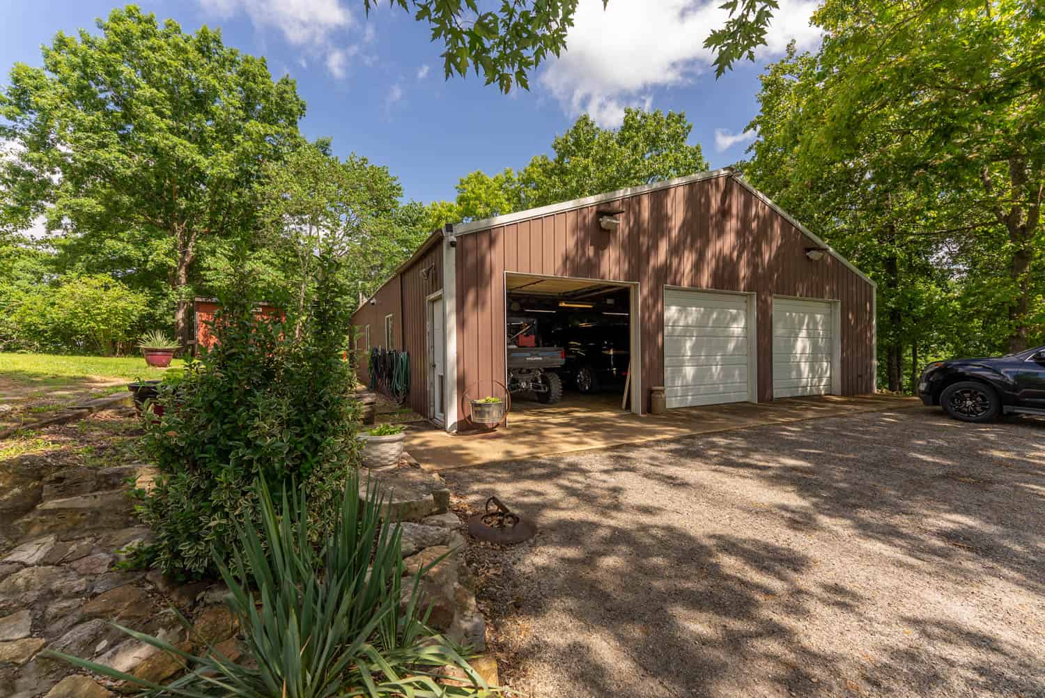 88-Acre Horse Farm with Custom Ranch Home, Stables, Ponds & Private Gated Drive