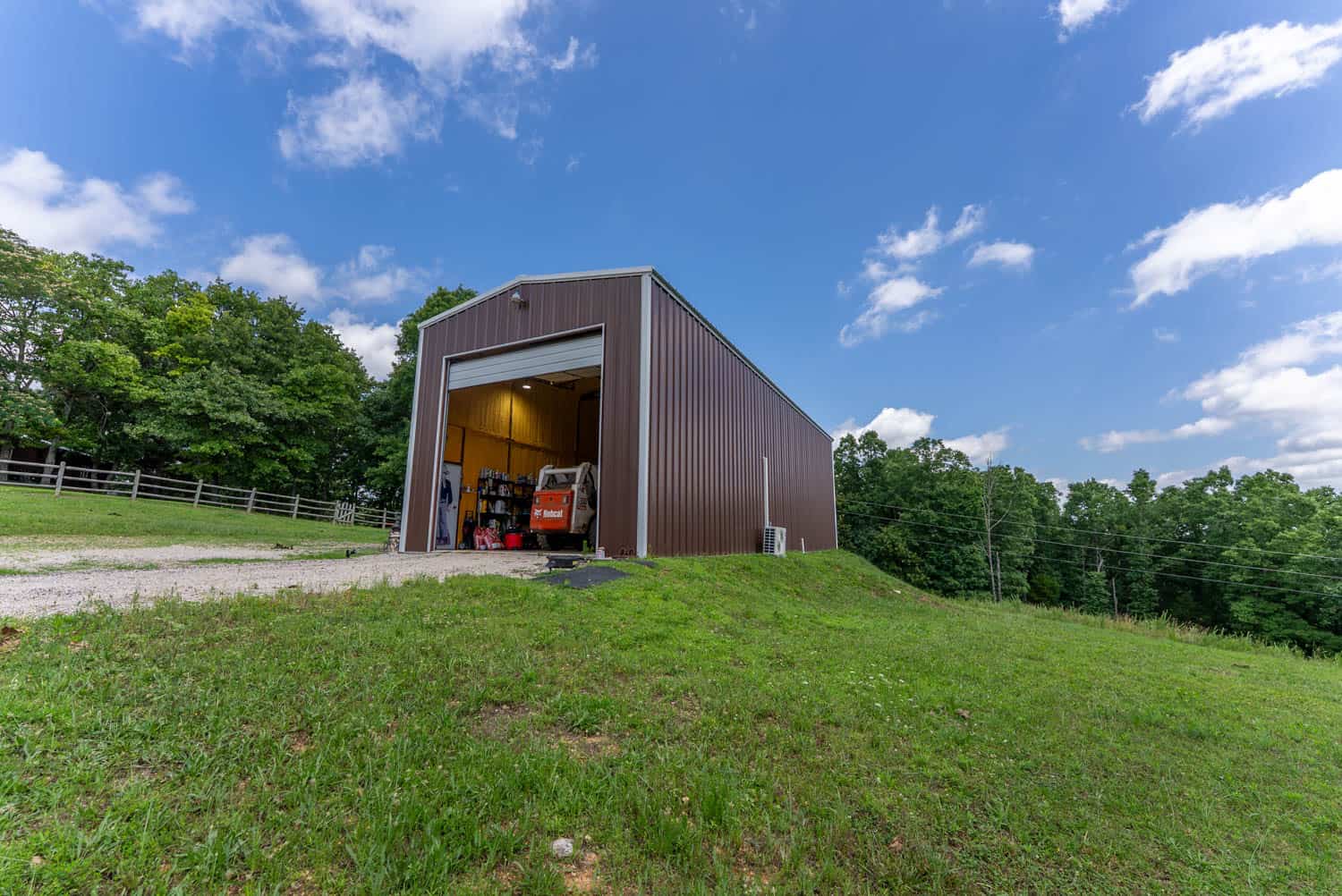 88-Acre Horse Farm with Custom Ranch Home, Stables, Ponds & Private Gated Drive