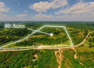 88-Acre Horse Farm with Custom Ranch Home, Stables, Ponds & Private Gated Drive
