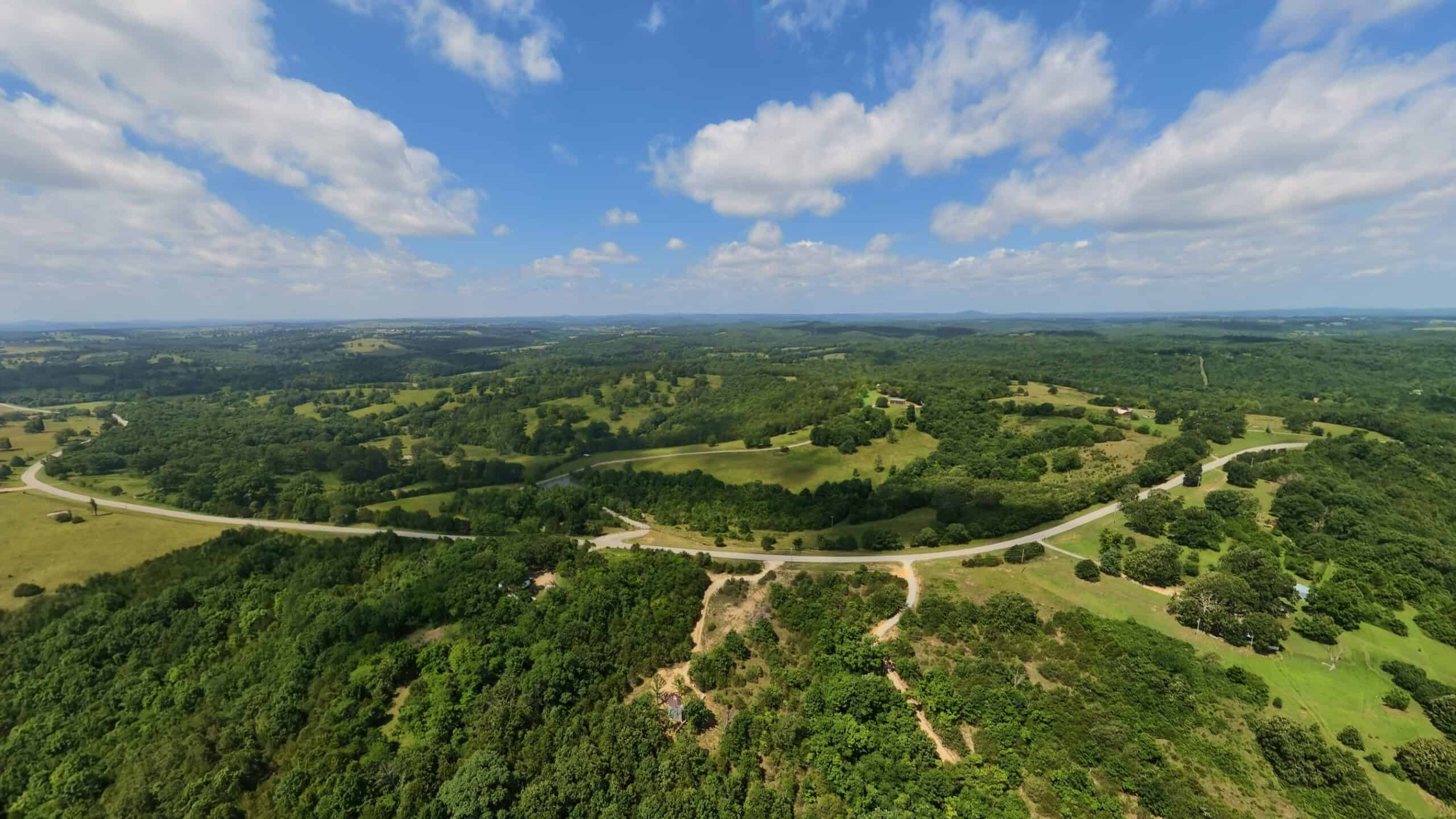 88-Acre Horse Farm with Custom Ranch Home, Stables, Ponds & Private Gated Drive
