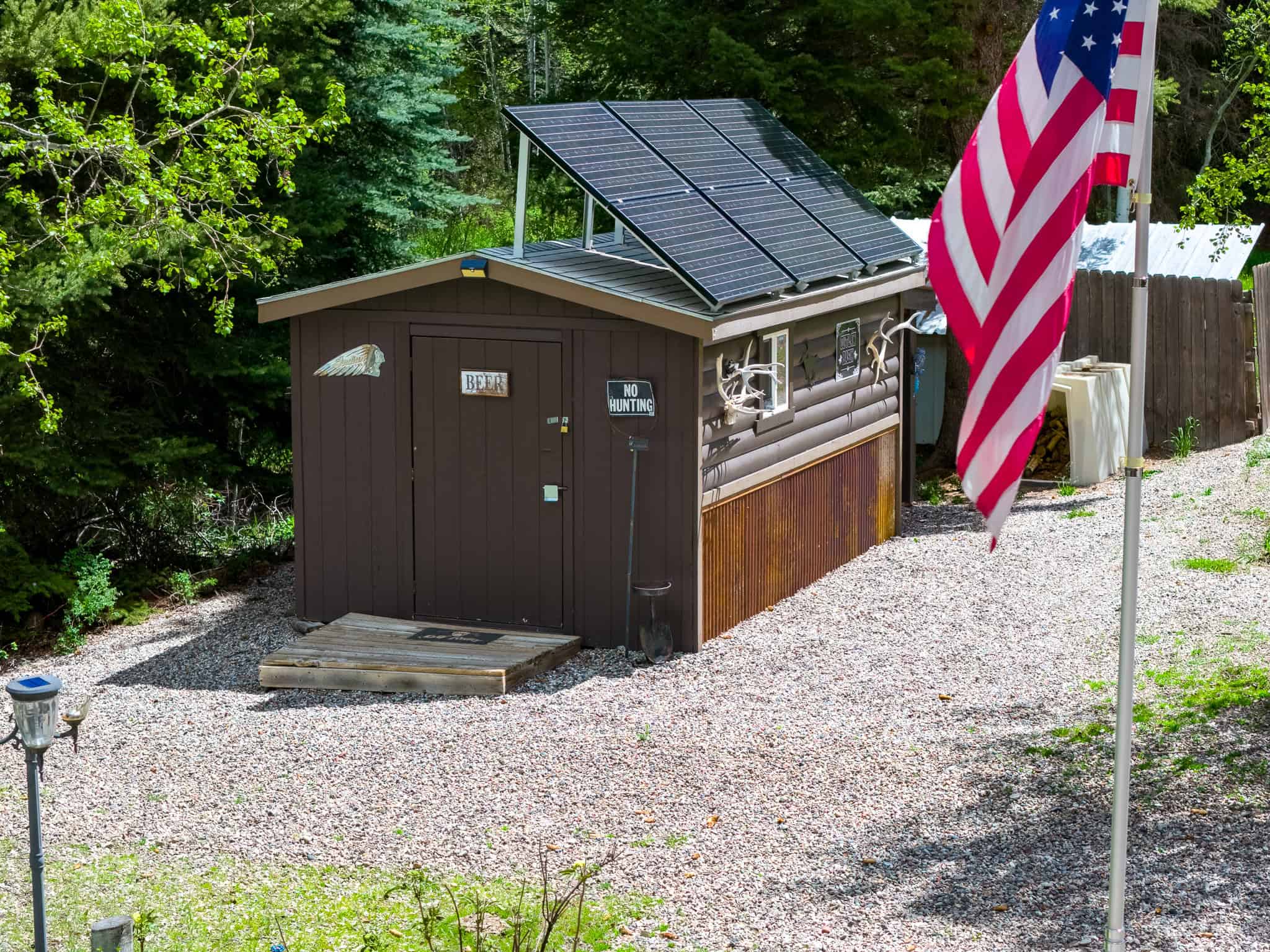 Colorado Mountain Hunting Retreat Surrounded By Thousands of Acres of Public Land in Garfield County With Low Flowing Creek and Multiple Cabins and Lodge