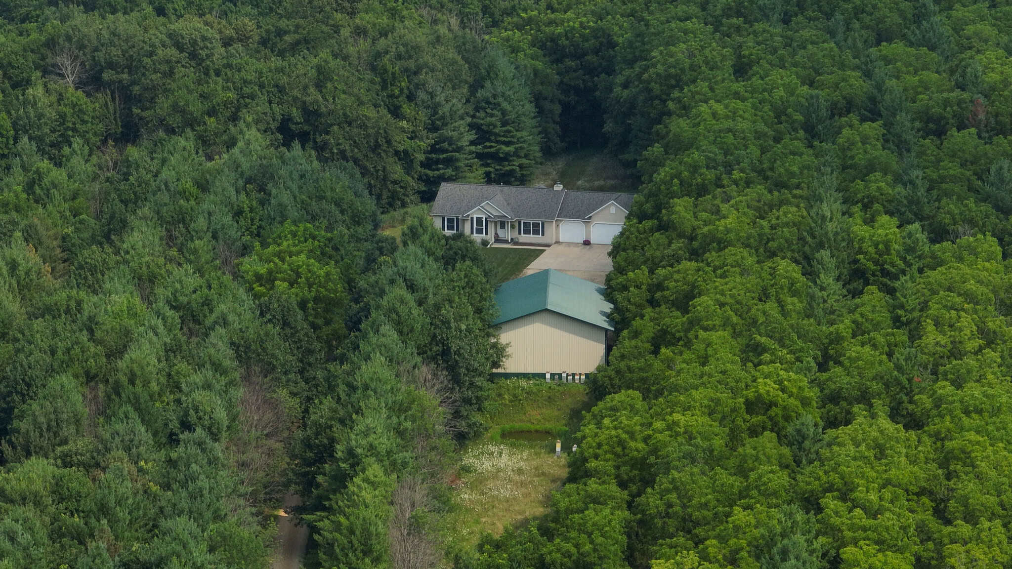 40-Acre Richland County Hunting Retreat with Ridge-Top Ranch Home & Trophy Whitetail History
