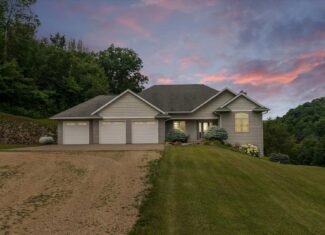 Luxury Vernon County Estate on 141 Acres with Organic Farmland, Views & Hunting