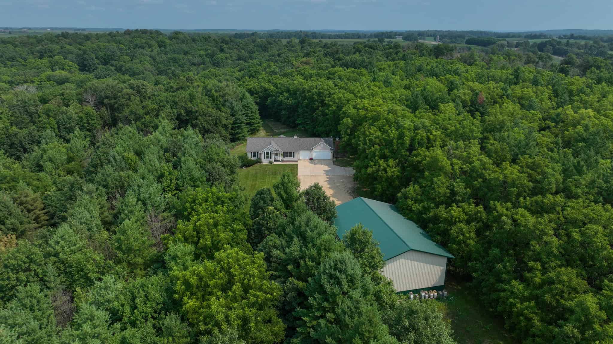 40-Acre Richland County Hunting Retreat with Ridge-Top Ranch Home & Trophy Whitetail History