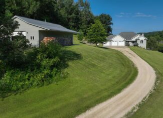 Luxury Vernon County Estate on 141 Acres with Organic Farmland, Views & Hunting