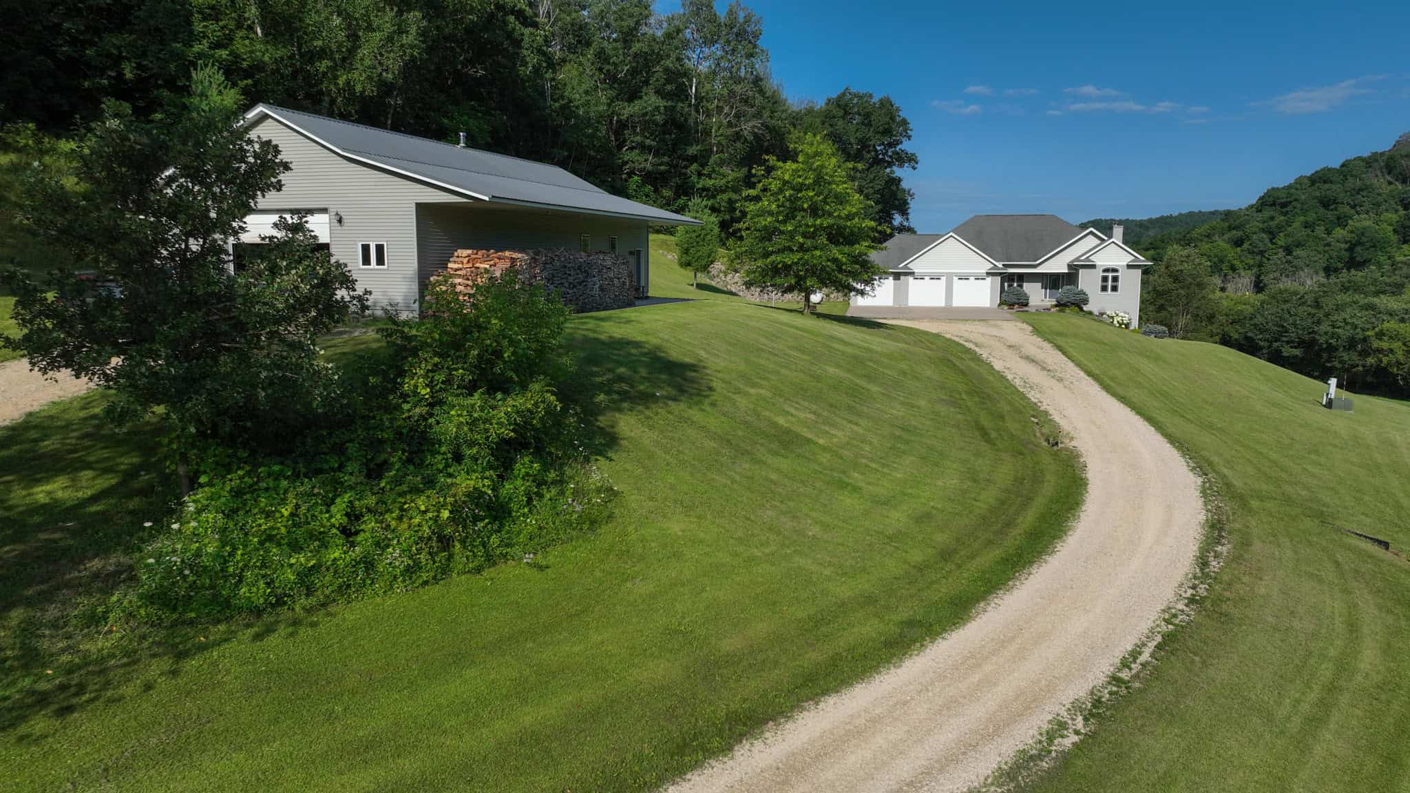 Luxury Vernon County Estate on 141 Acres with Organic Farmland, Views & Hunting