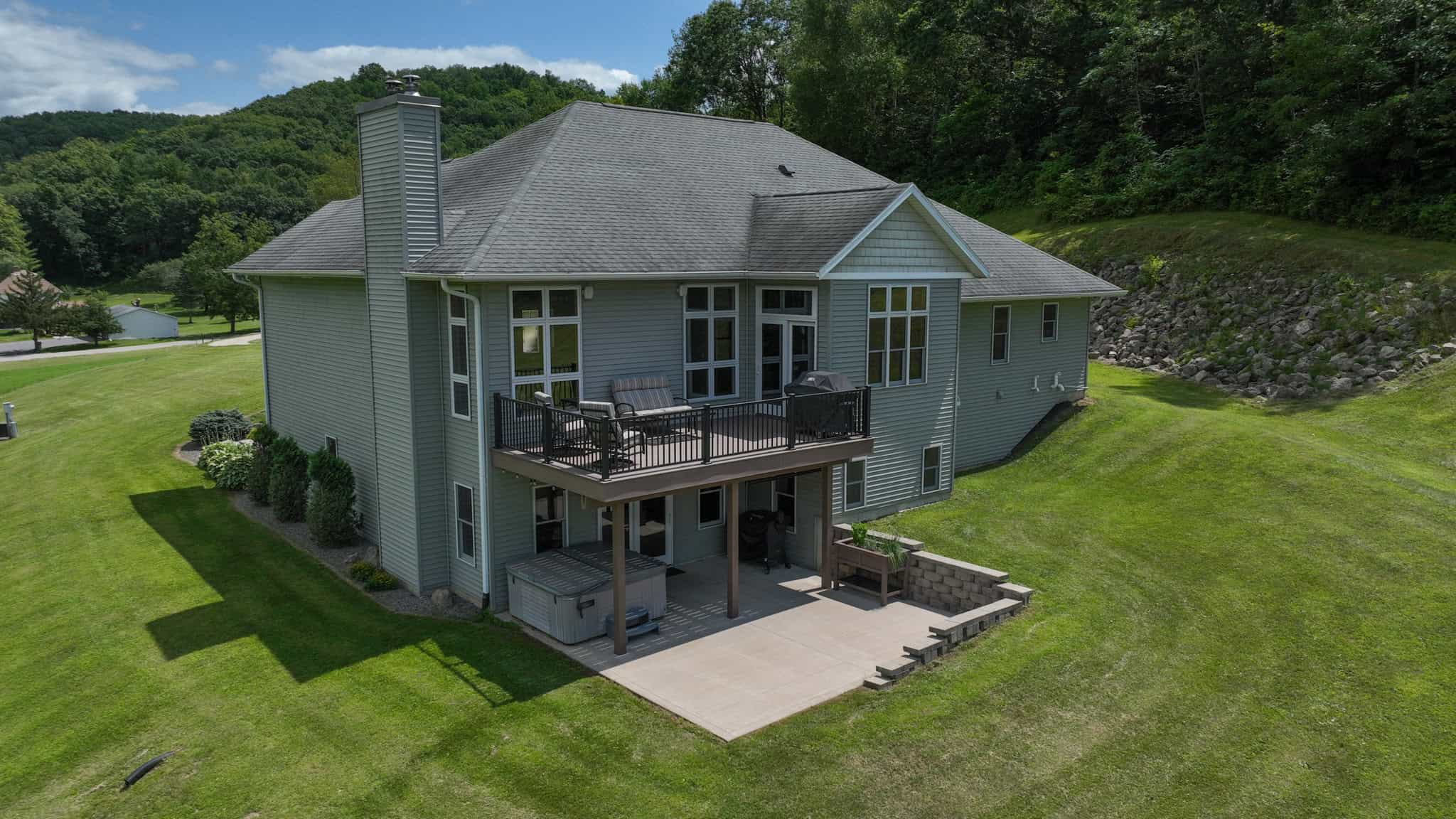 Luxury Vernon County Estate on 141 Acres with Organic Farmland, Views & Hunting