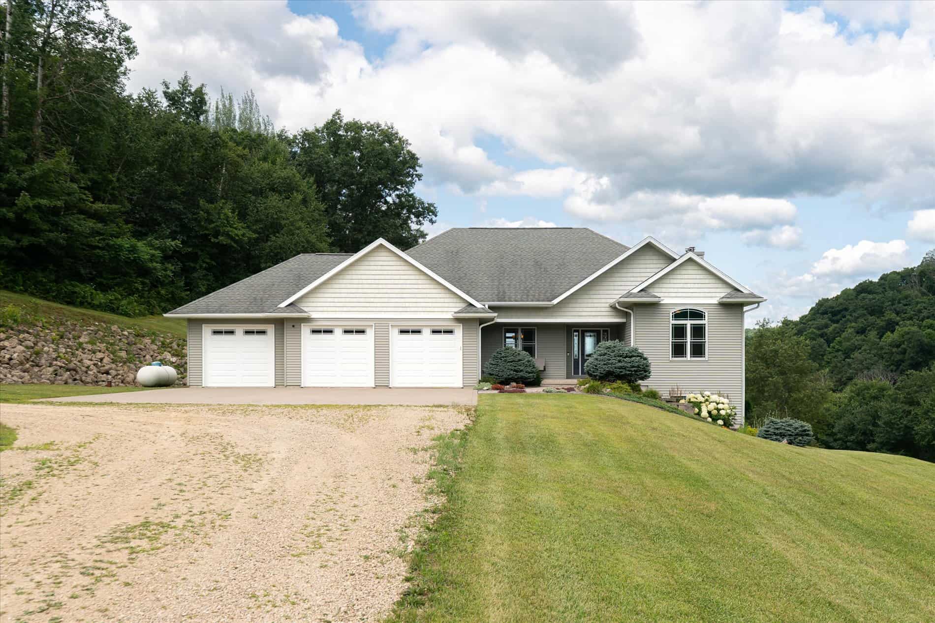 Luxury Vernon County Estate on 141 Acres with Organic Farmland, Views & Hunting