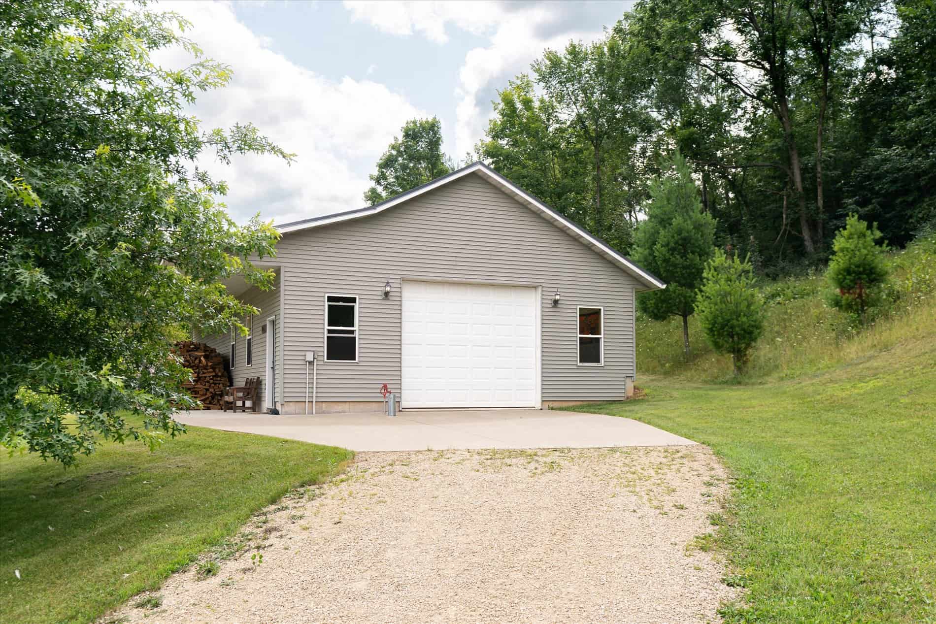 Luxury Vernon County Estate on 141 Acres with Organic Farmland, Views & Hunting