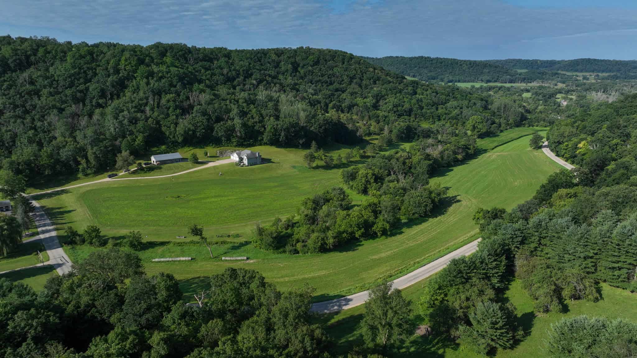 Luxury Vernon County Estate on 141 Acres with Organic Farmland, Views & Hunting