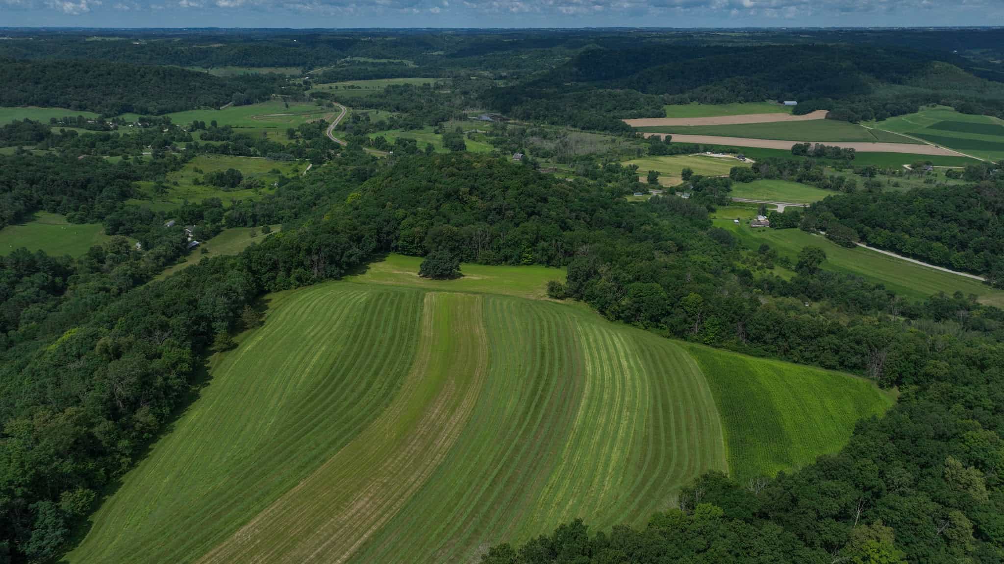 Luxury Vernon County Estate on 141 Acres with Organic Farmland, Views & Hunting