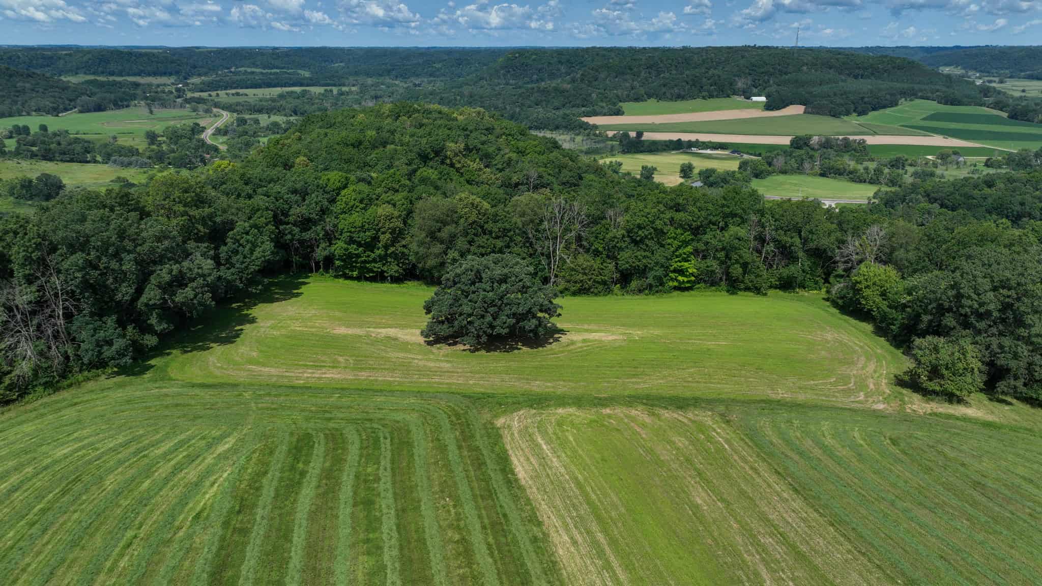 Luxury Vernon County Estate on 141 Acres with Organic Farmland, Views & Hunting