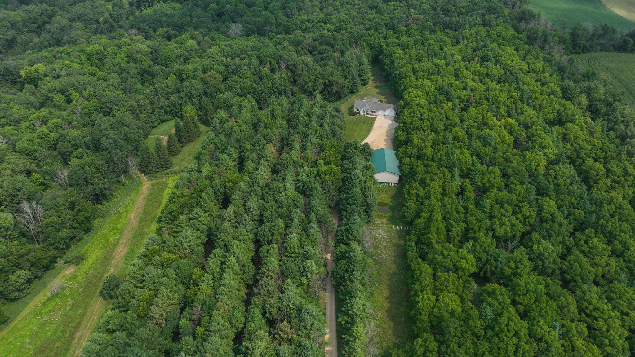 40-Acre Richland County Hunting Retreat with Ridge-Top Ranch Home & Trophy Whitetail History