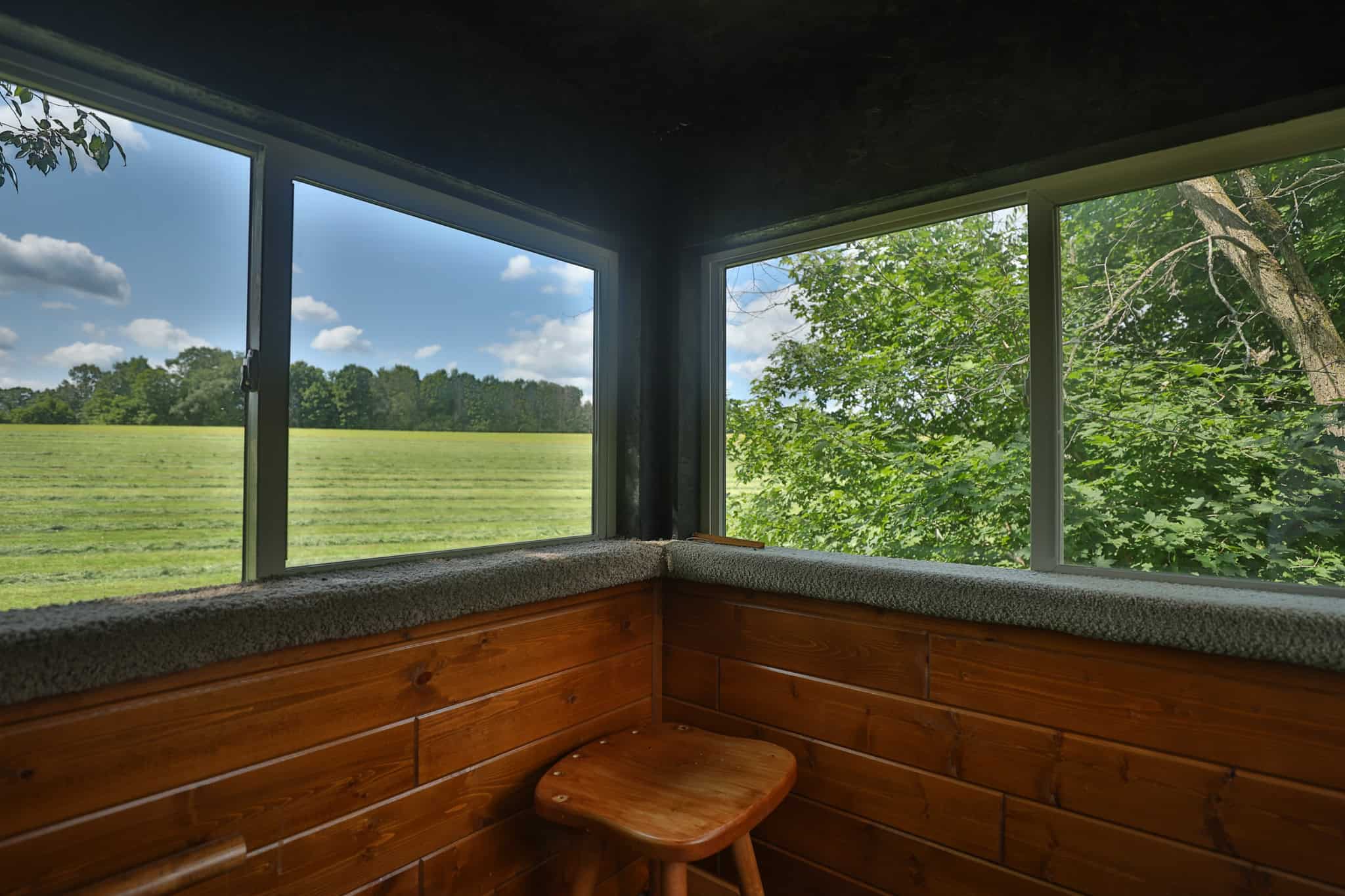 Luxury Vernon County Estate on 141 Acres with Organic Farmland, Views & Hunting