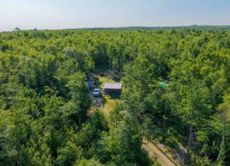 Escape to Maine: Off-Grid Solar Cabin on 45 Acres with Brook