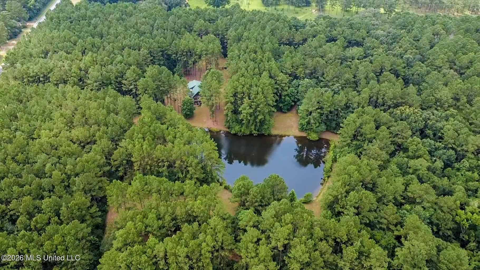 Log Cabin on 25 Acres with Ponds in Southwest MS