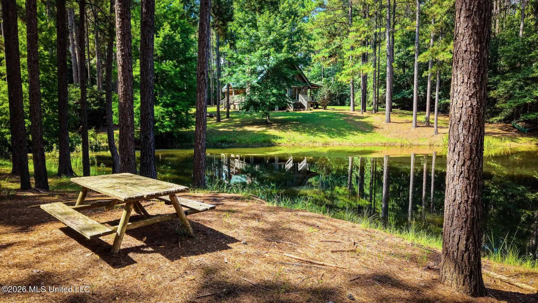 Log Cabin on 25 Acres with Ponds in Southwest MS