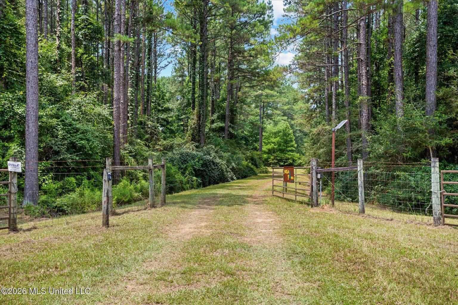 Log Cabin on 25 Acres with Ponds in Southwest MS