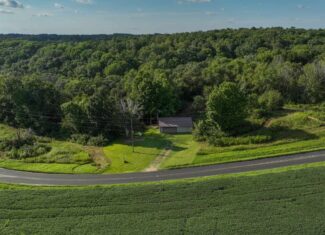 35-Acre Southwest Wisconsin Hunting Camp with Proven Whitetail History, Hardwood Ridges & Turnkey Game-Care Setup
