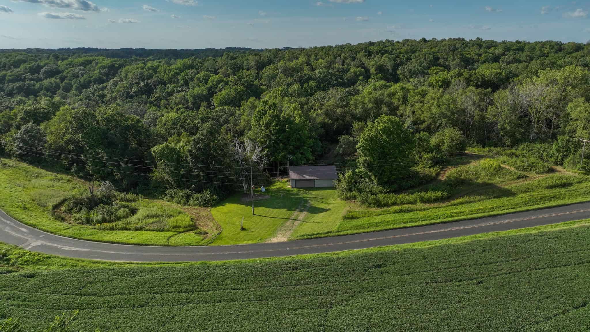 35-Acre Southwest Wisconsin Hunting Camp with Proven Whitetail History, Hardwood Ridges & Turnkey Game-Care Setup